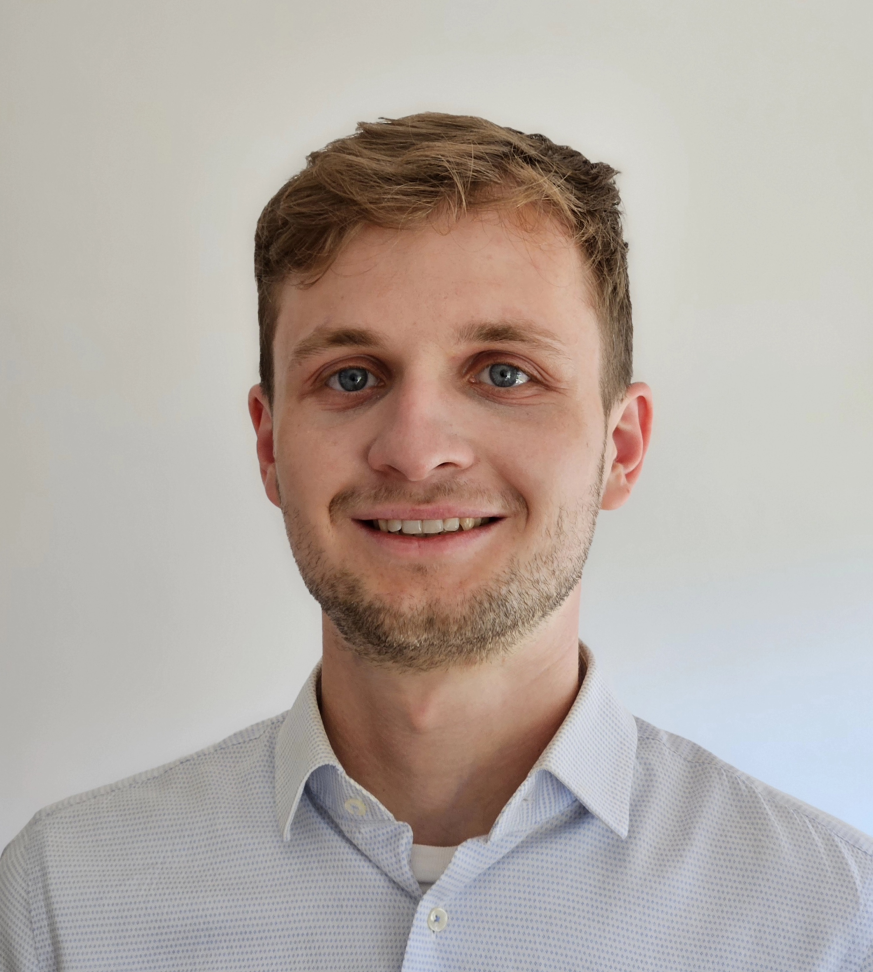 Portrait photo of the author with a transparent background